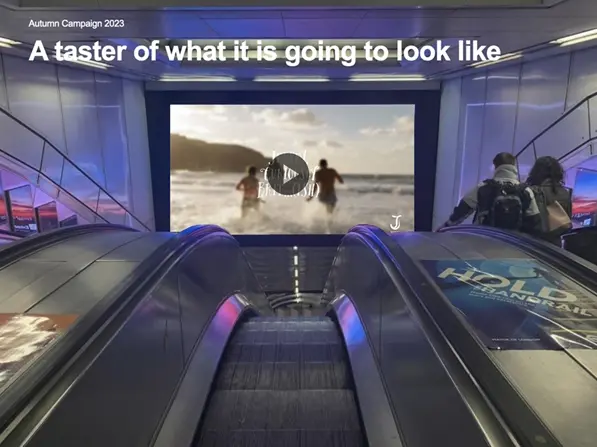 Representation of escalator with video in background